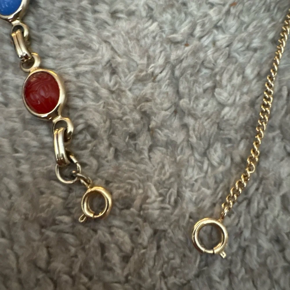 EUC multi stone gold tone bracelet